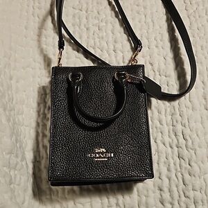 Coach black mini phone tote bag
